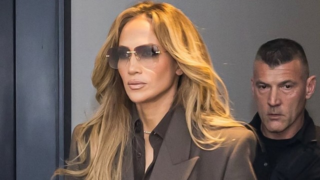 Jennifer Lopez stuns with a power suit moment, and her new manicure peaks out from under her sleeve. 