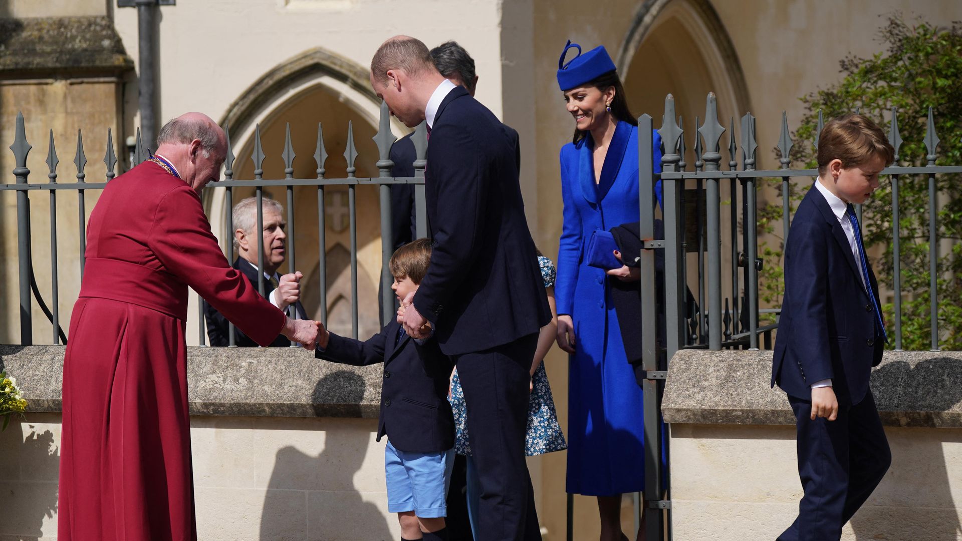prince louis shaking hands with dean of windsor 