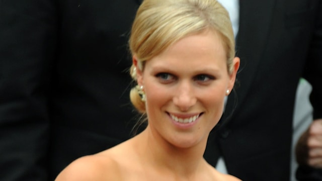 Zara Tindall in a green strapless bridesmaid dress