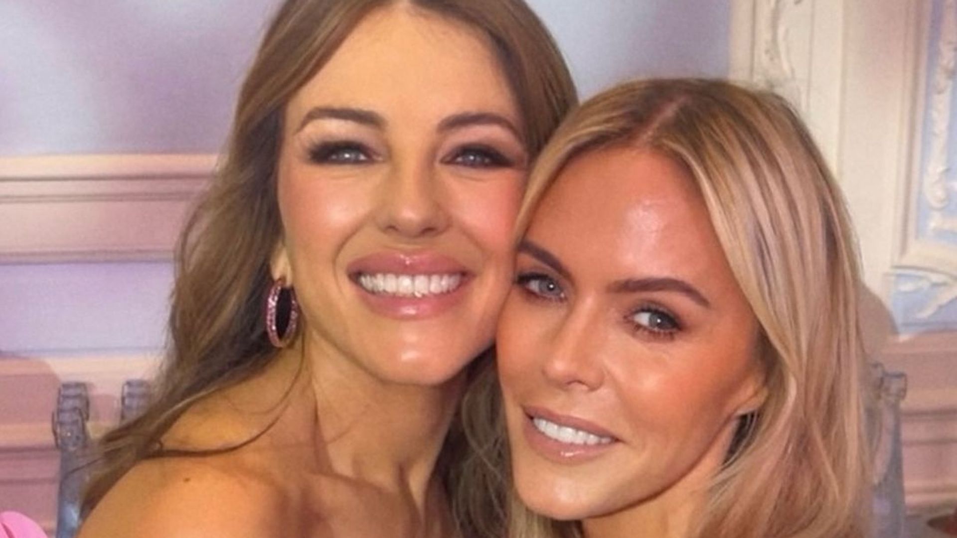 Elizabeth Hurley, 59, stuns in a tiny mini dress alongside Patsy Kensit, 56, in racy throwback snap