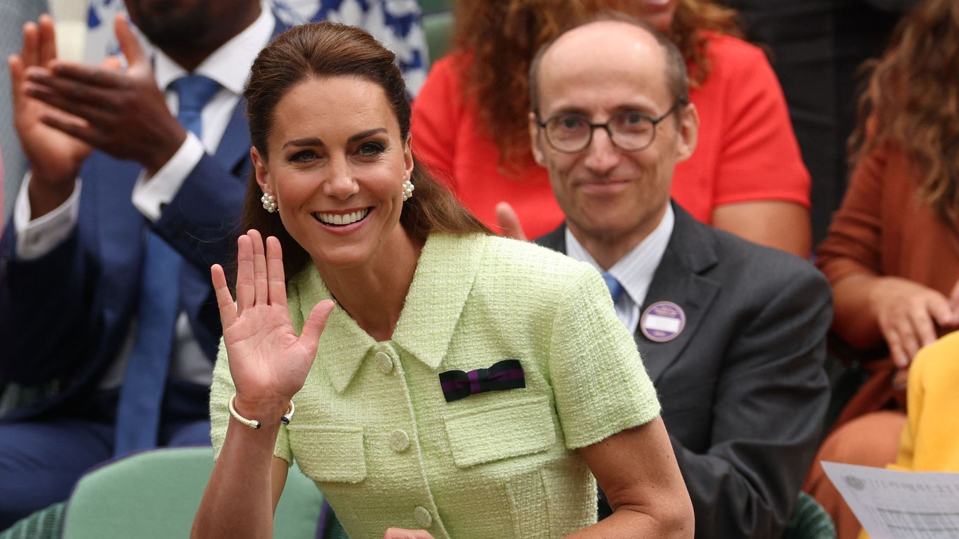 Kate Middleton waving from royal box at Wimbledon