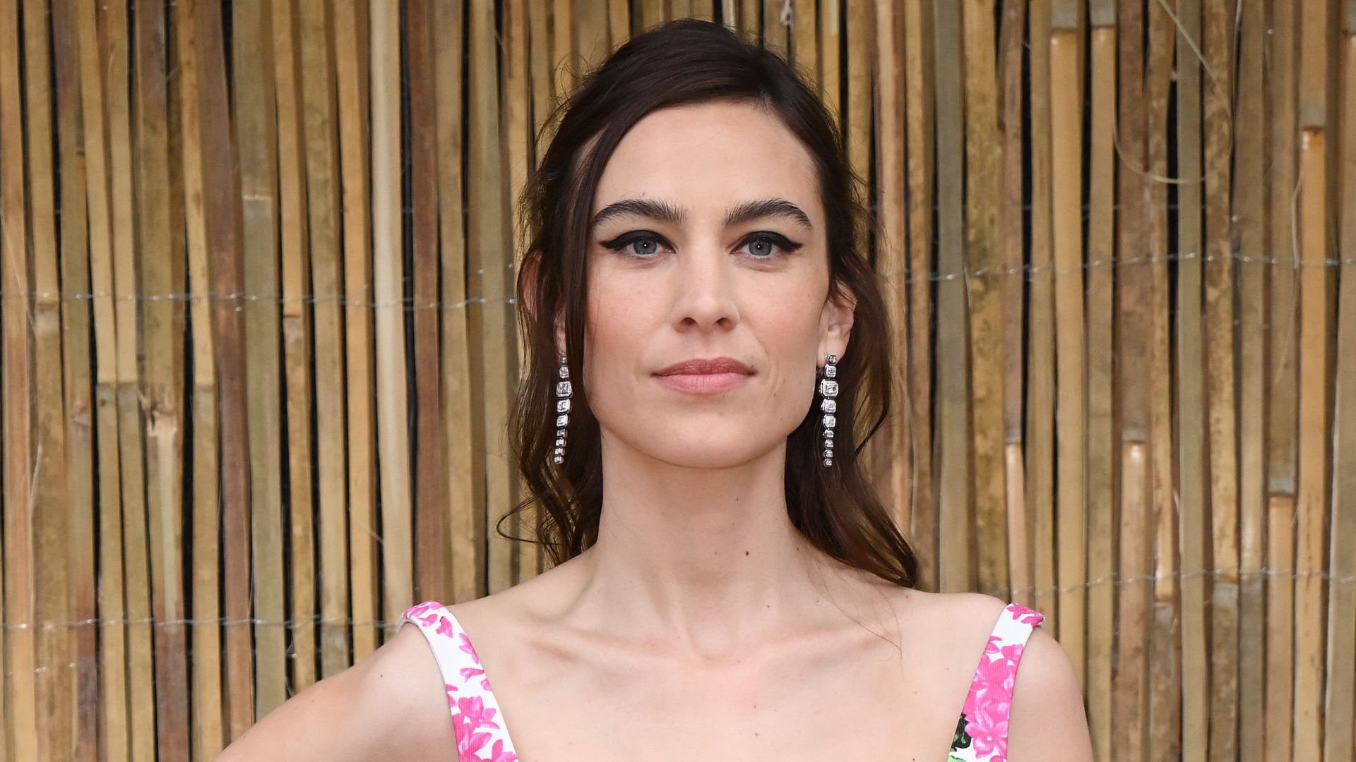 Alexa Chung sports a floral mini dress at The Serpentine Gallery Summer Party
