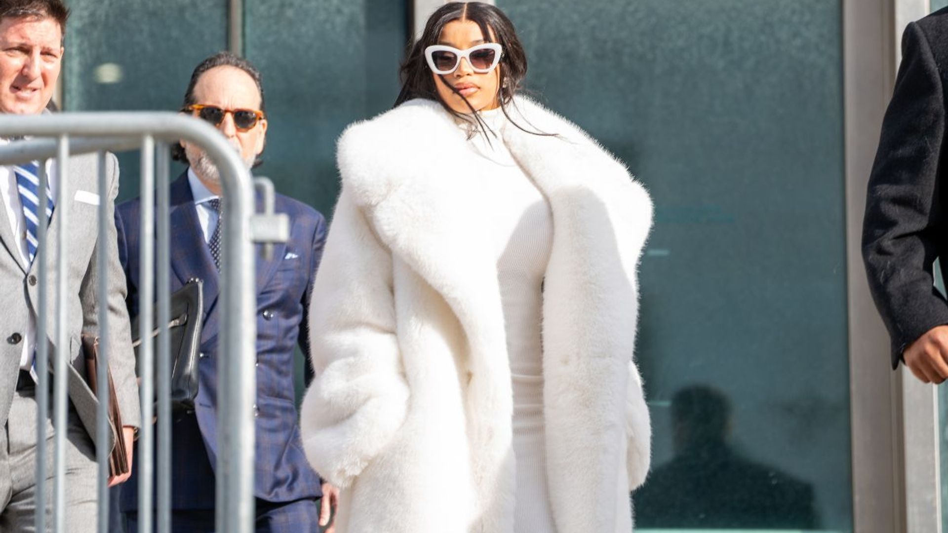 Cardi B's courtroom white coat and skin-tight turtleneck outfit is next  level extra - see photos