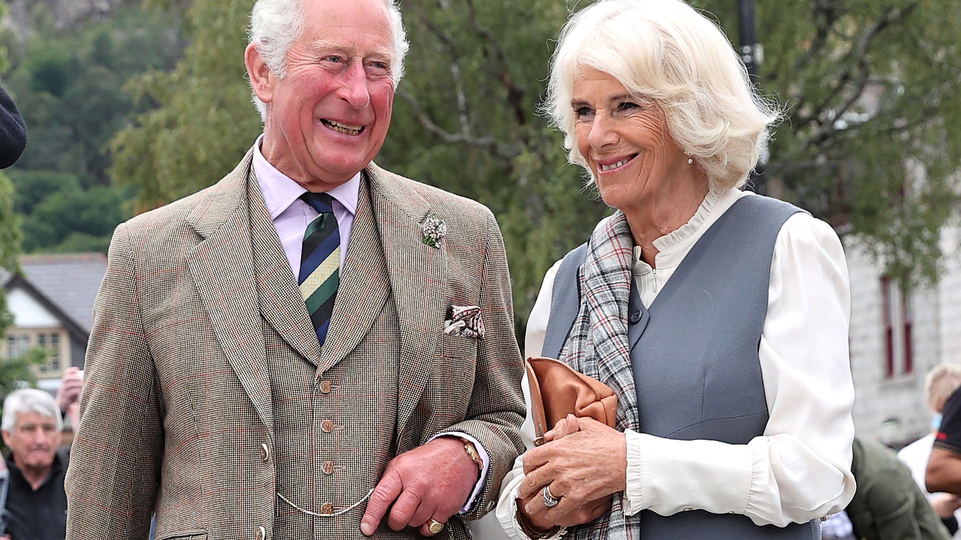 King Charles wears tweed suit while Camilla wears grey waistcoat