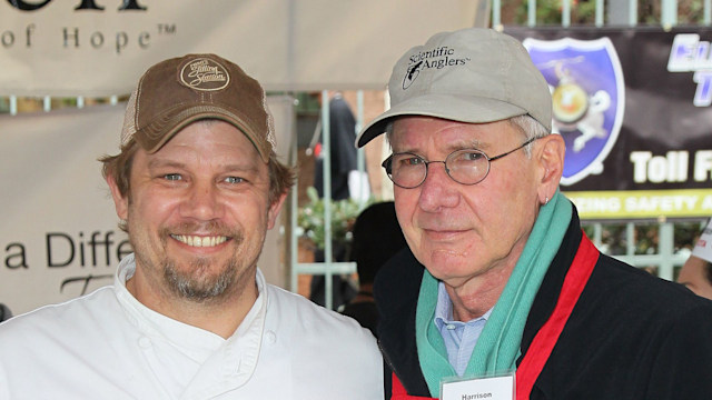 Chef Ben Ford (L) and father actor Harrison Ford attend the Los Angeles Mission's Christmas Eve for the homeless at the Los Angeles Mission on December 24, 2012 in Los Angeles, California