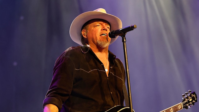 photo of pat green on stage with guitar