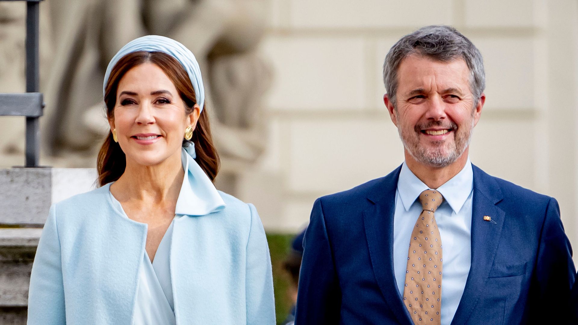 King Frederik and Queen Mary's towering kids join them for rare outing