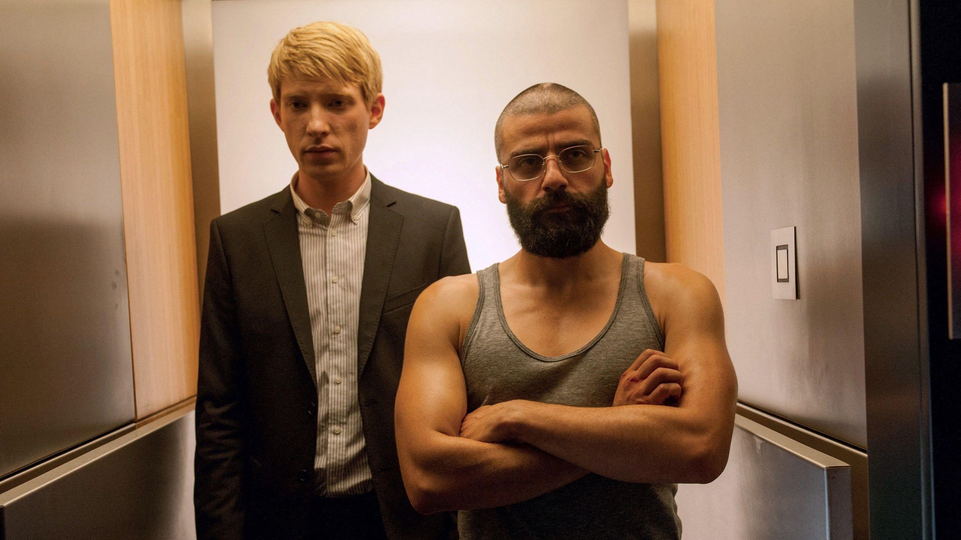 Domhnall Gleeson and Oscar Isaac in a still image from Ex Machina