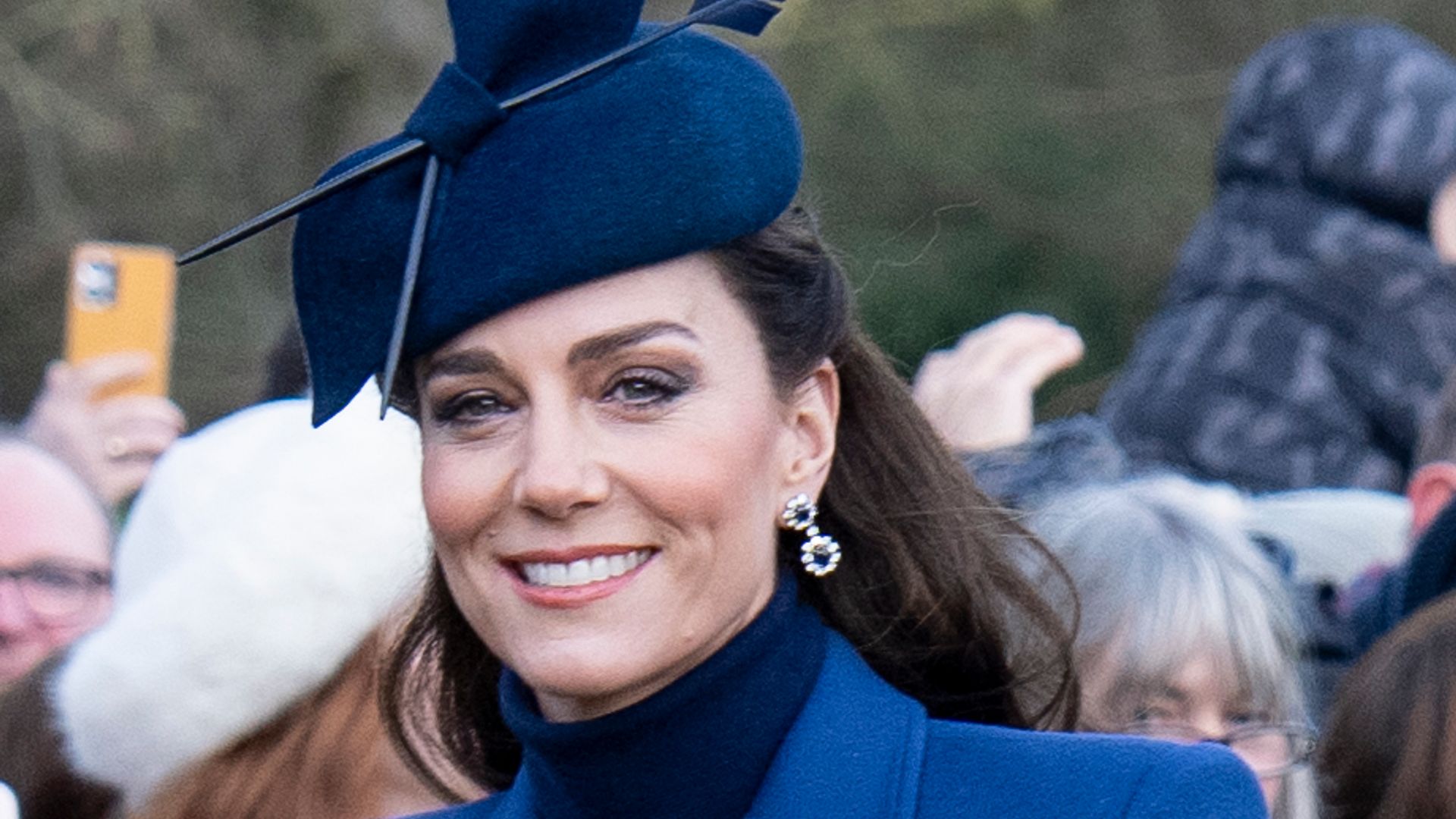 Kate Middleton wearing blue coat on Christmas Day