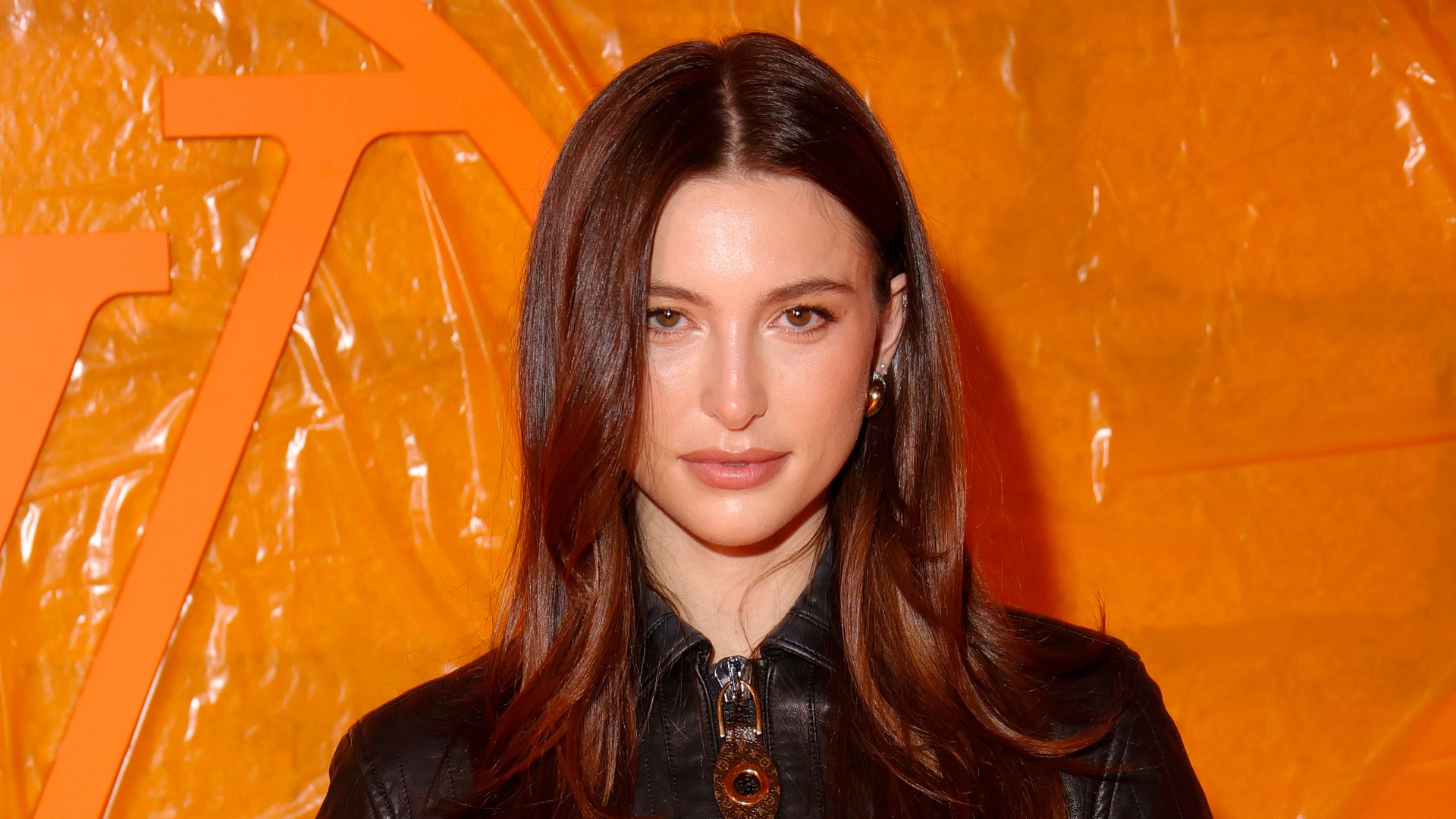 Eve Jobs in a leather outfit