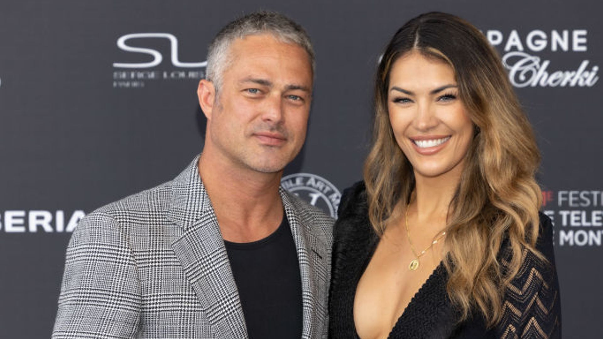 Taylor Kinney and Ashley Cruger attends the opening ceremony during the 61st Monte Carlo TV Festival on June 17, 2022 in Monte-Carlo, Monaco.