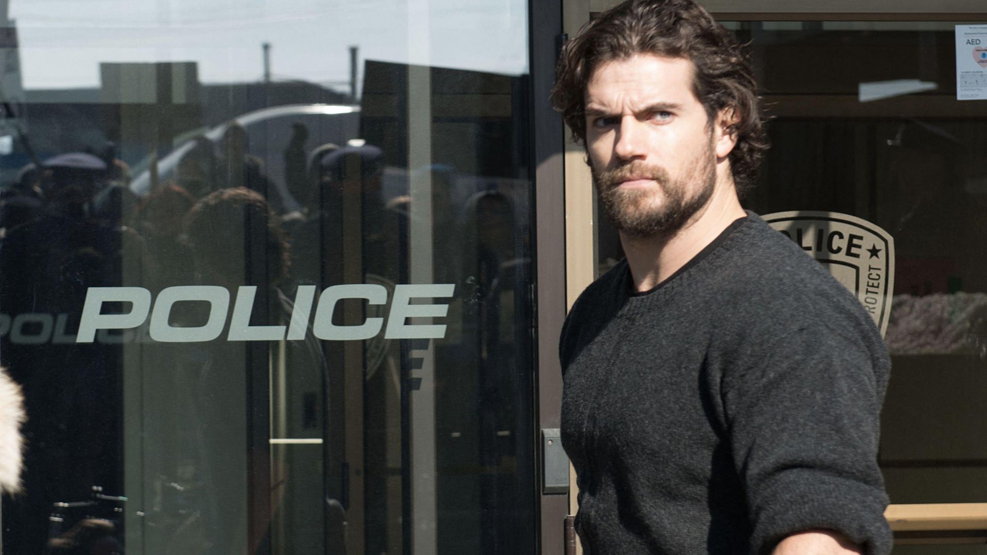 Henry Cavill in a black jumper in a still from Night Hunter