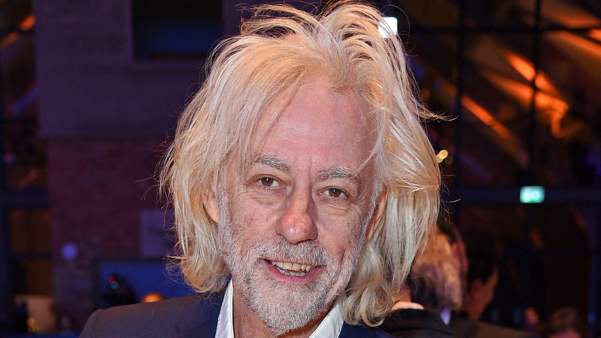 Sir Bob Geldof in blue suit 