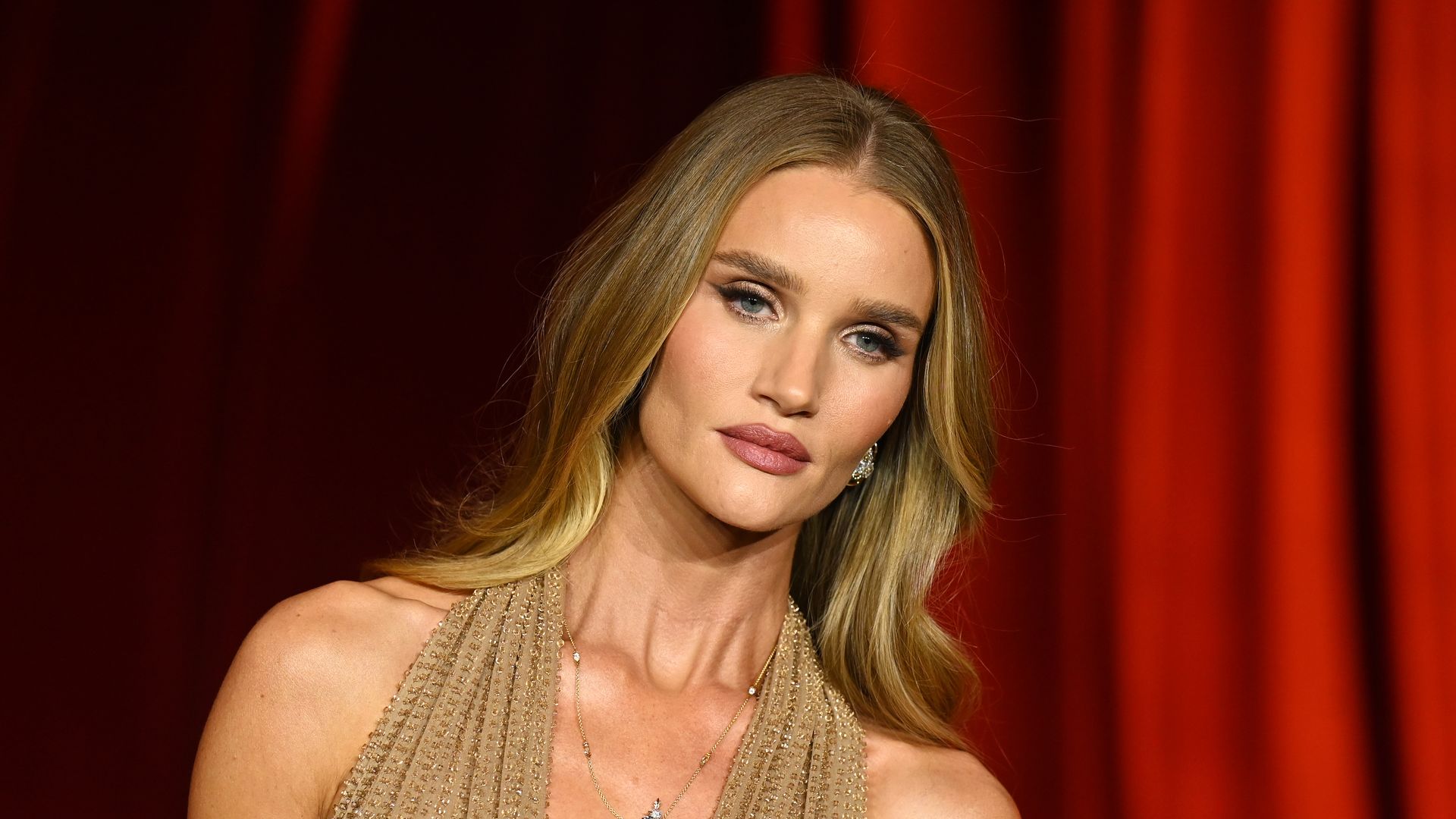 Rosie Huntington Whiteley's sheer bodysuit and leather trousers look is peak party season chic