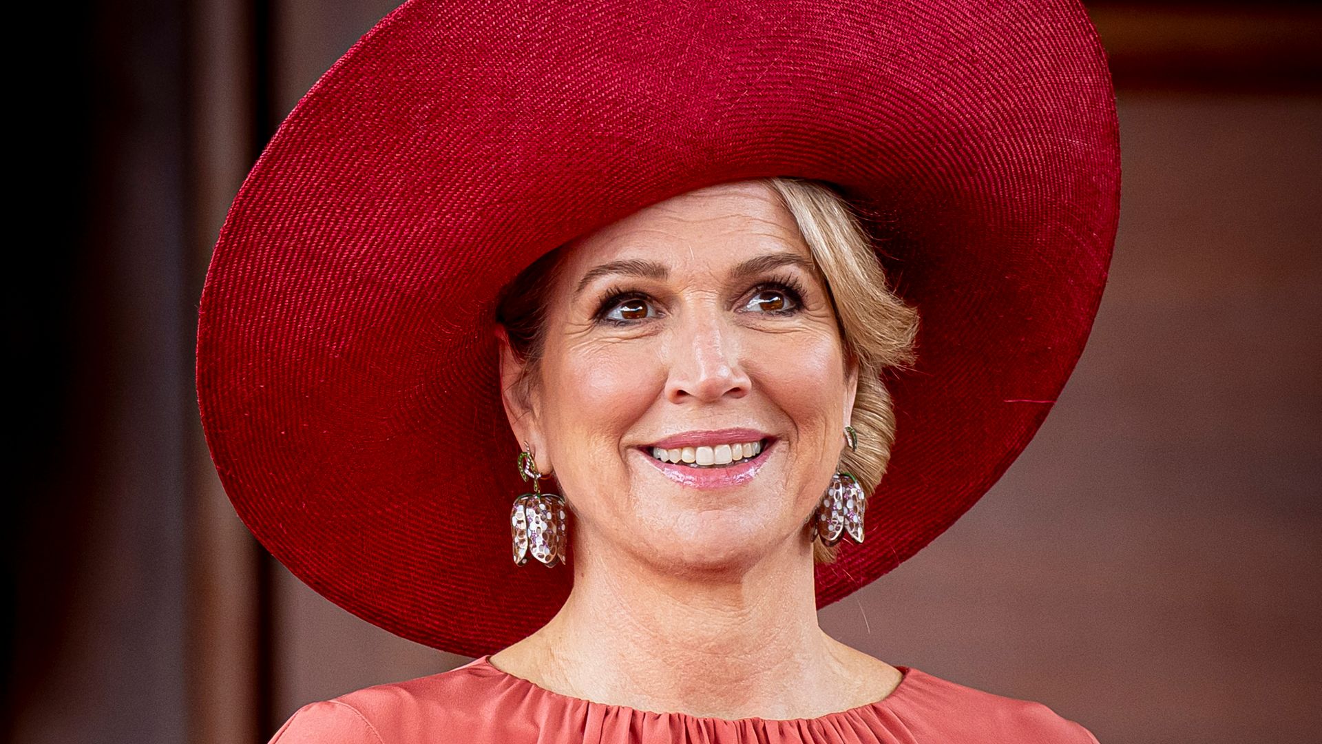 Queen Maxima’s beauty is a spectacle in show-stopping scarlet dress and glittering jewels in Kenya