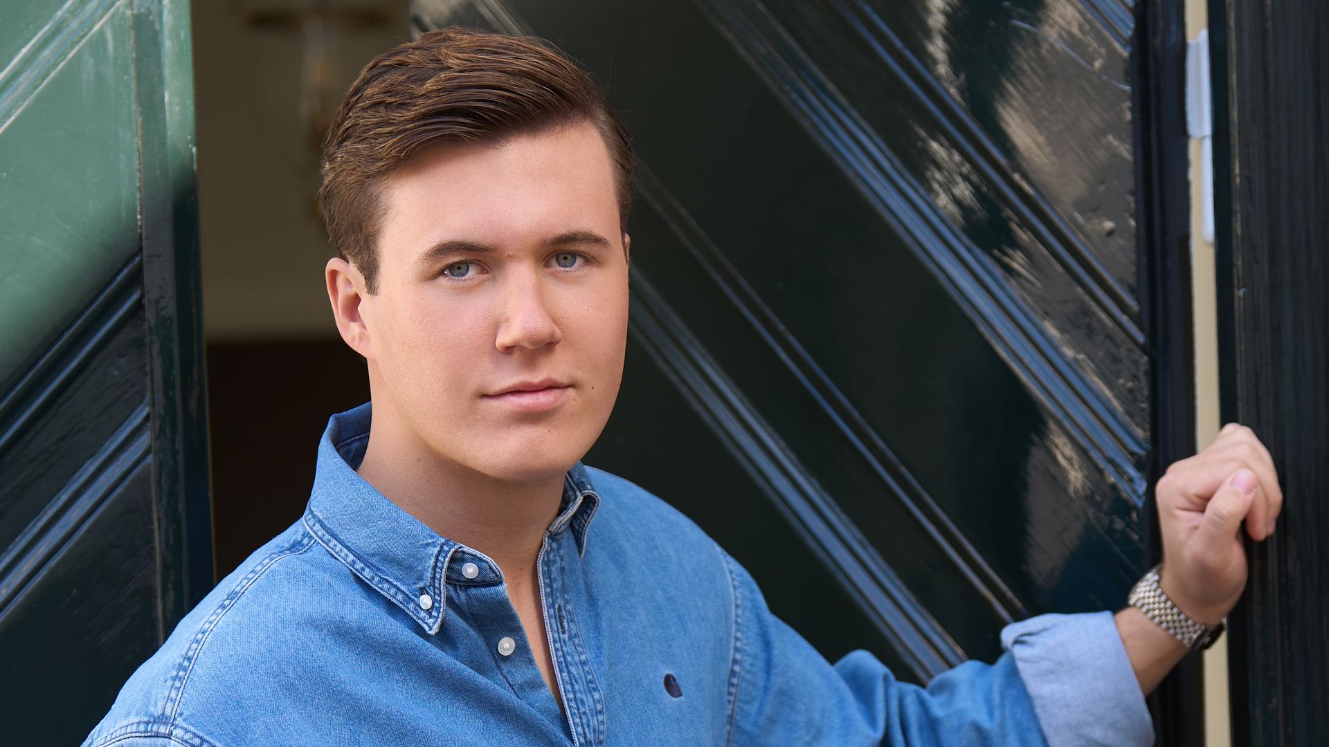 Crown Prince Christian at front door of Amalienborg