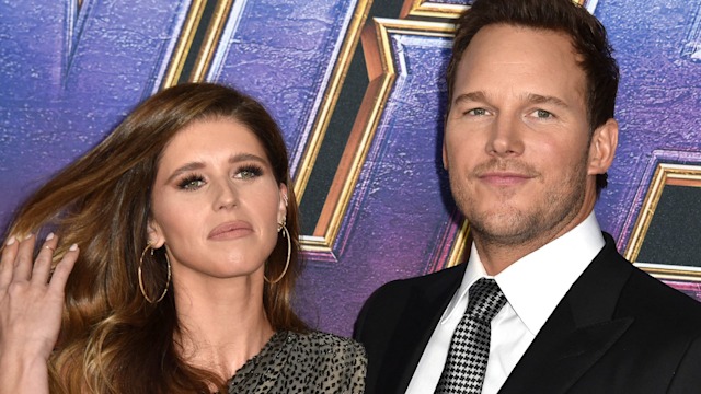 Katherine Schwarzenegger flipping her hair back next to Chris Pratt