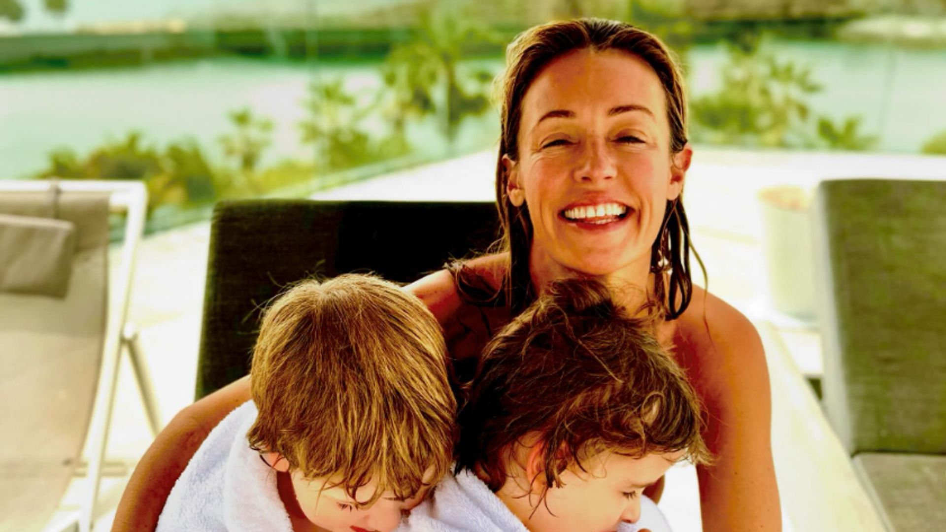 Cat Deeley shares sun-soaked photo with sons - and their wild hair is identical