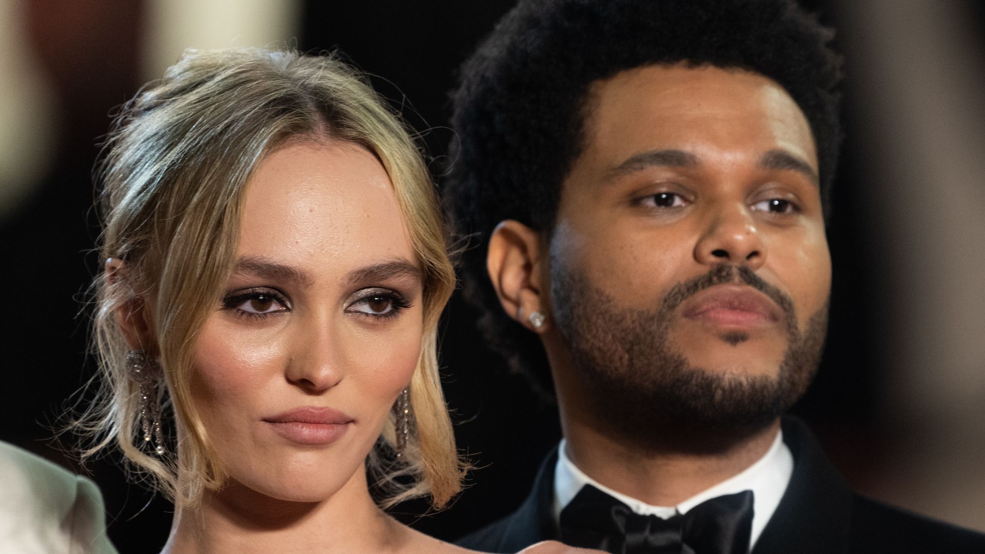 CANNES, FRANCE - MAY 22: Lily-Rose Depp and Abel Makkonen Tesfaye, The Weeknd attend the "The Idol" red carpet during the 76th annual Cannes film festival