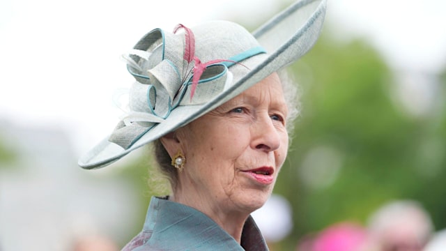 Princess Anne in a green outfit