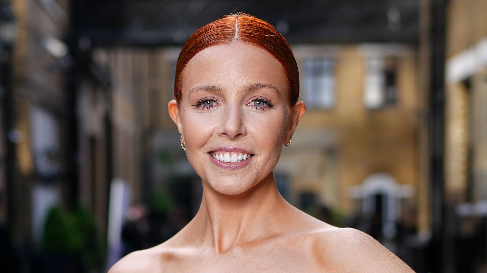 Stacey Dooley is a vision in Hailey Bieber's leg-lengthening red hot mini dress