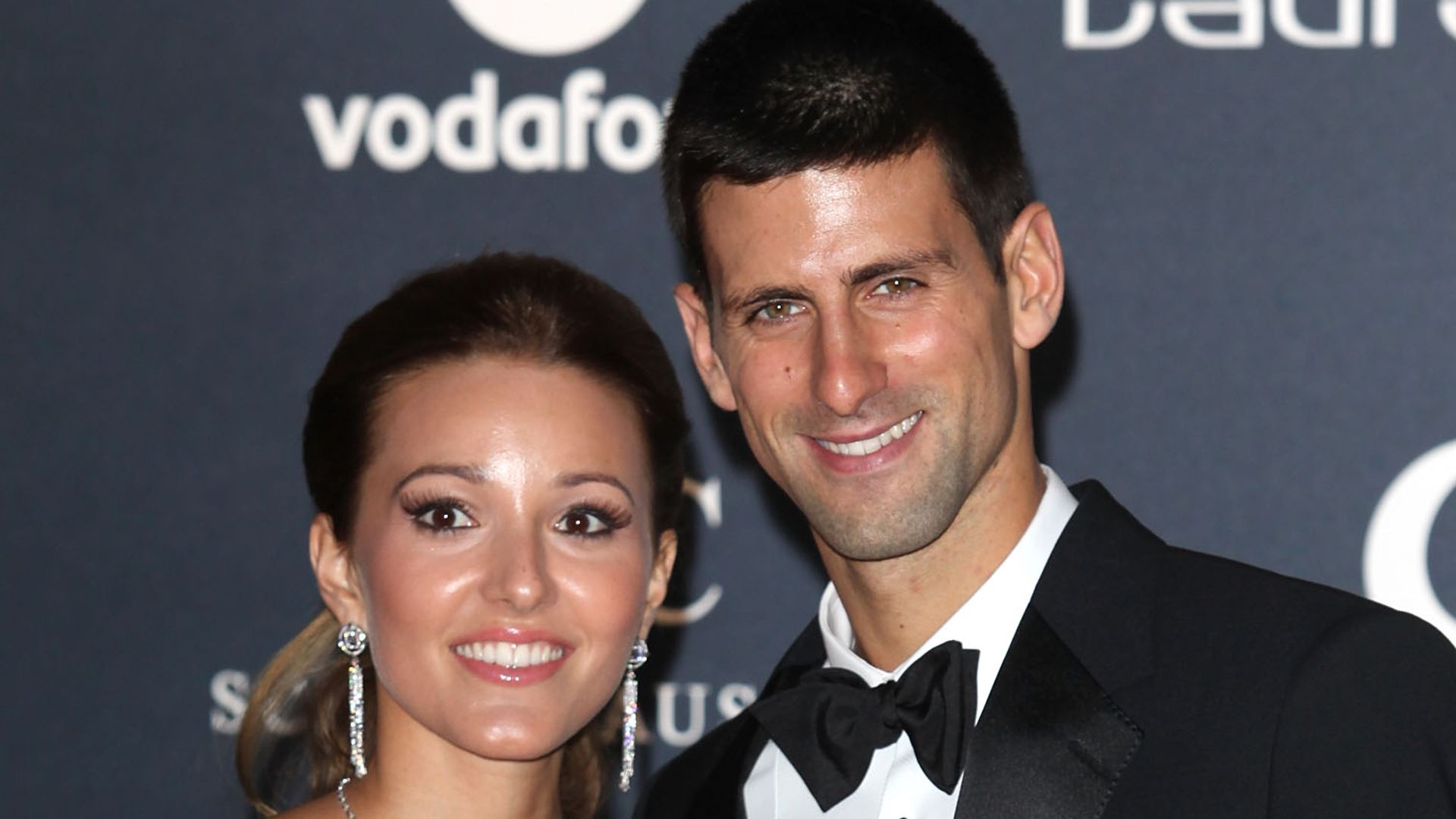 Jelena and Novak Djokovic posing on the red carpet