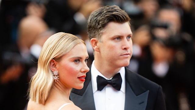 Colin Jost and Scarlett Johansson attend the "Asteroid City" red carpet during the 76th annual Cannes film festival at Palais des Festivals on May 23, 2023 in Cannes, France.