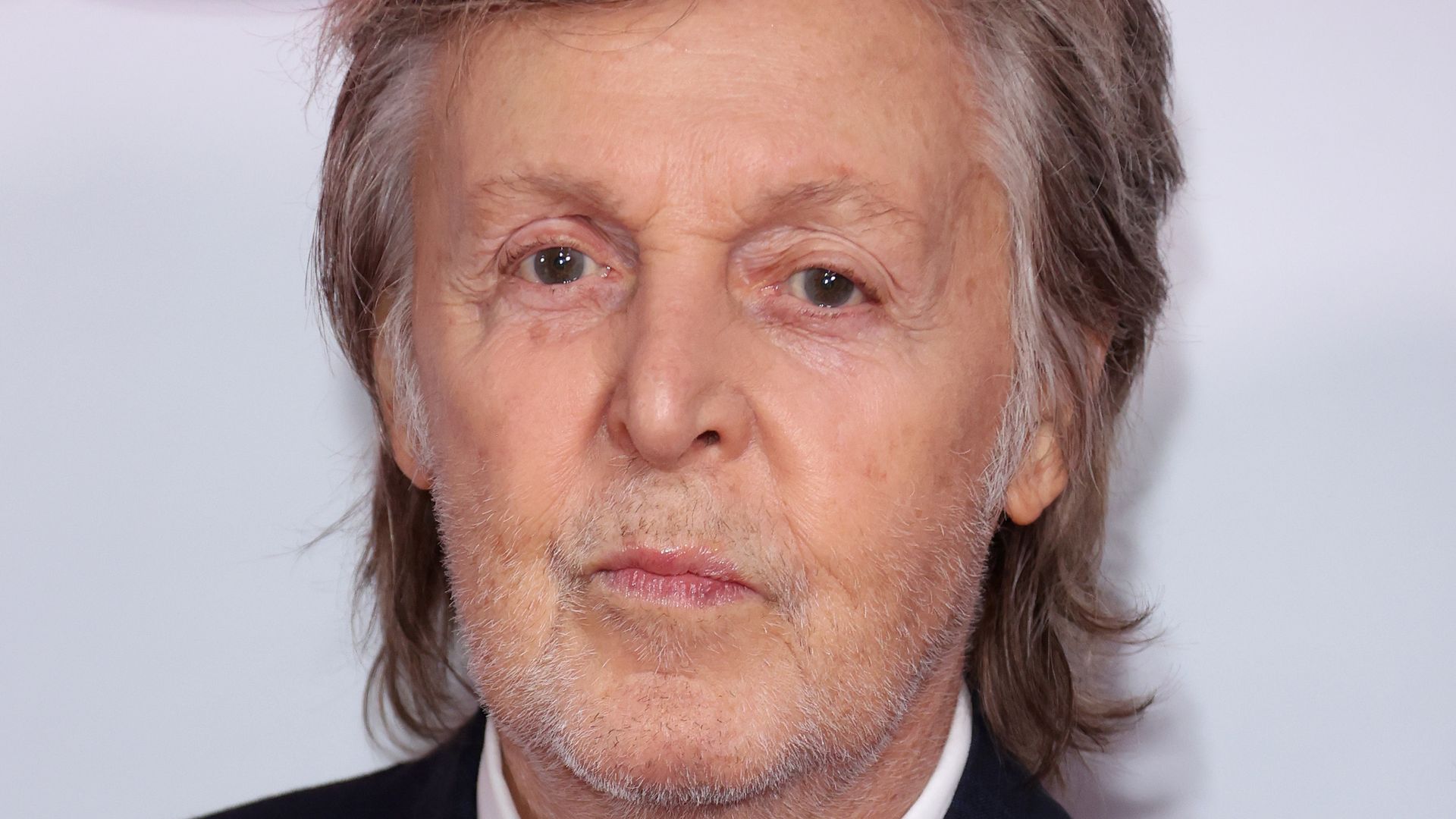 Sir Paul McCartney in suit 