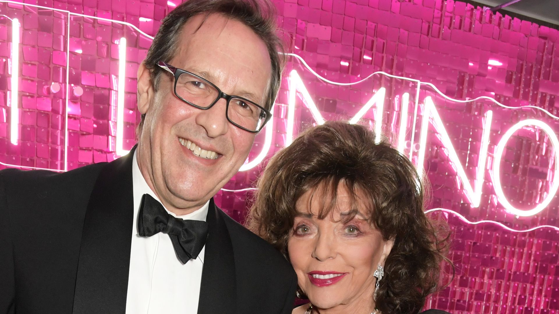 Joan Collins, 91, looks so chic in LBD on date night with husband Percy