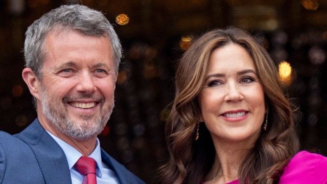 Frederik and Mary smiling from balcony