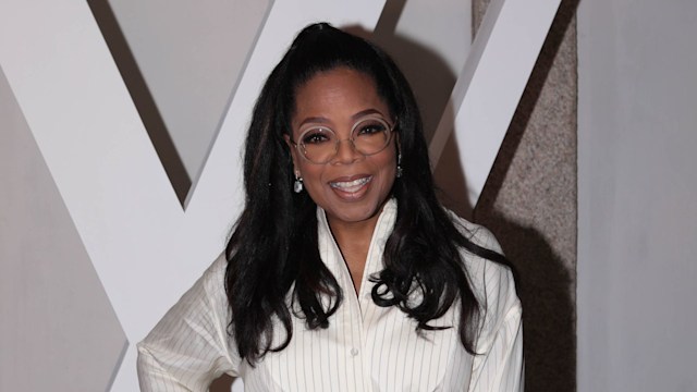 oprah winfrey smiling white shirt louis vuitton show