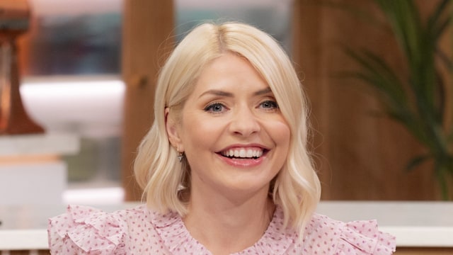 Holly Willoughby wears a pink floral blouse on This Morning