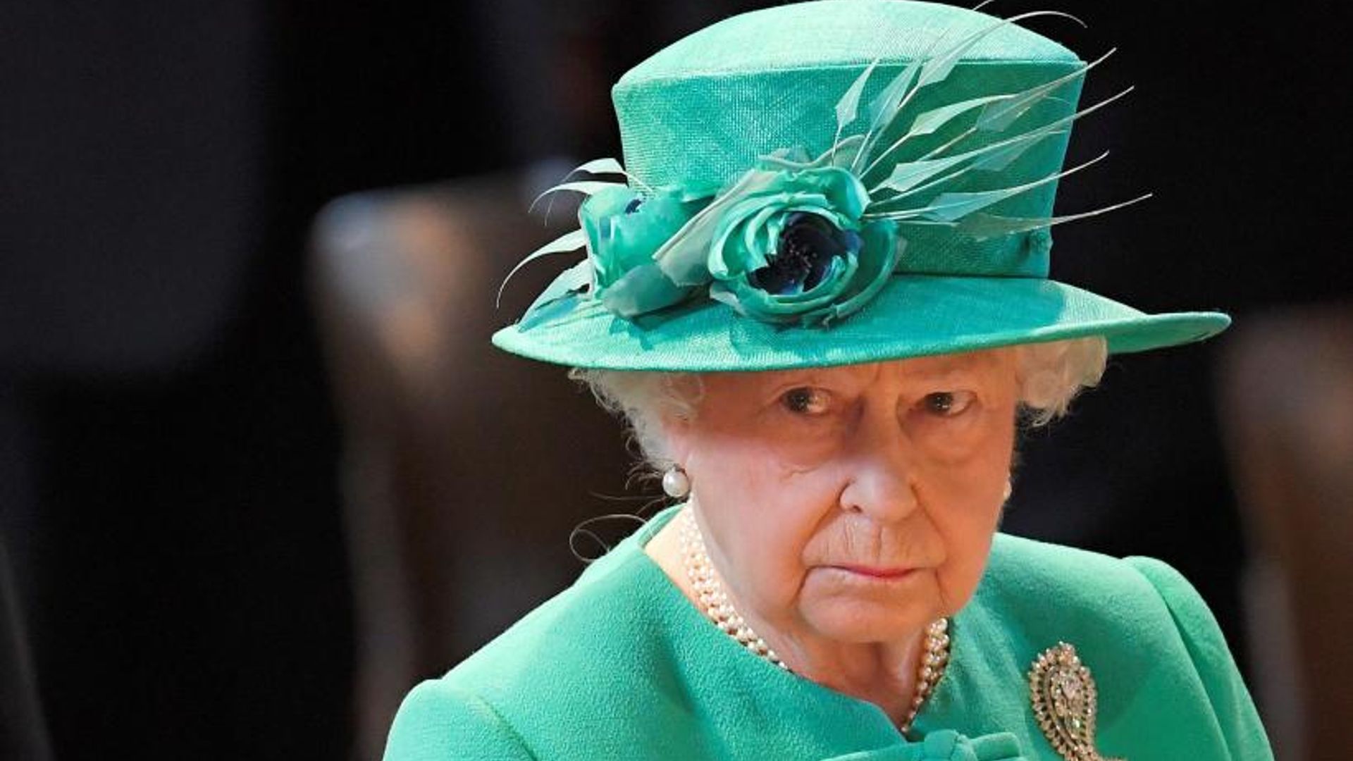the queen looking sad