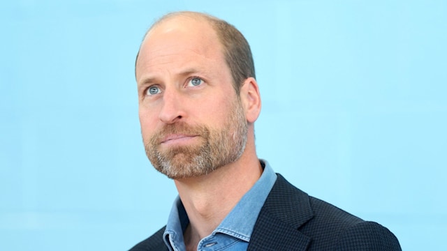 Prince William wearing blazer and denim shirt