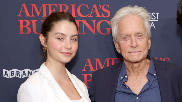  Michael Douglas (C) and his children Carys Zeta Douglas (L) and Dylan Michael Douglas attend an  "America's Burning" New York screening at DGA Theater on July 10, 2024 in New York City