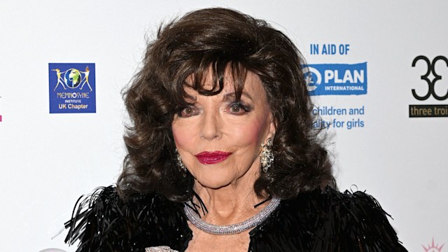 Joan Collins in a black plumed dress