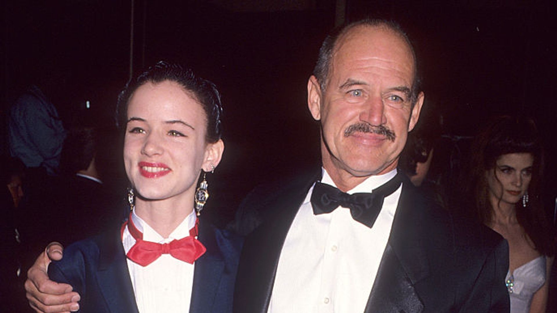 Geoffrey Lewis and Juliet Lewis both wearing suits at a red carpet event in 1992