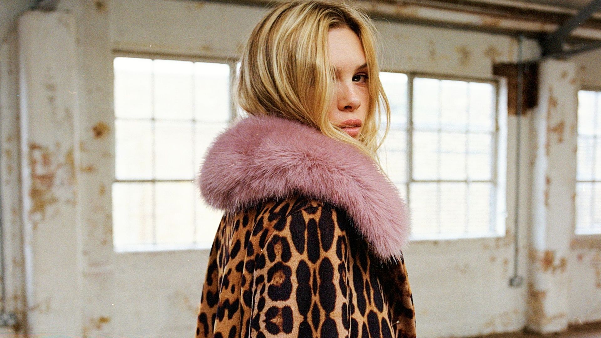 model in leopard print coat