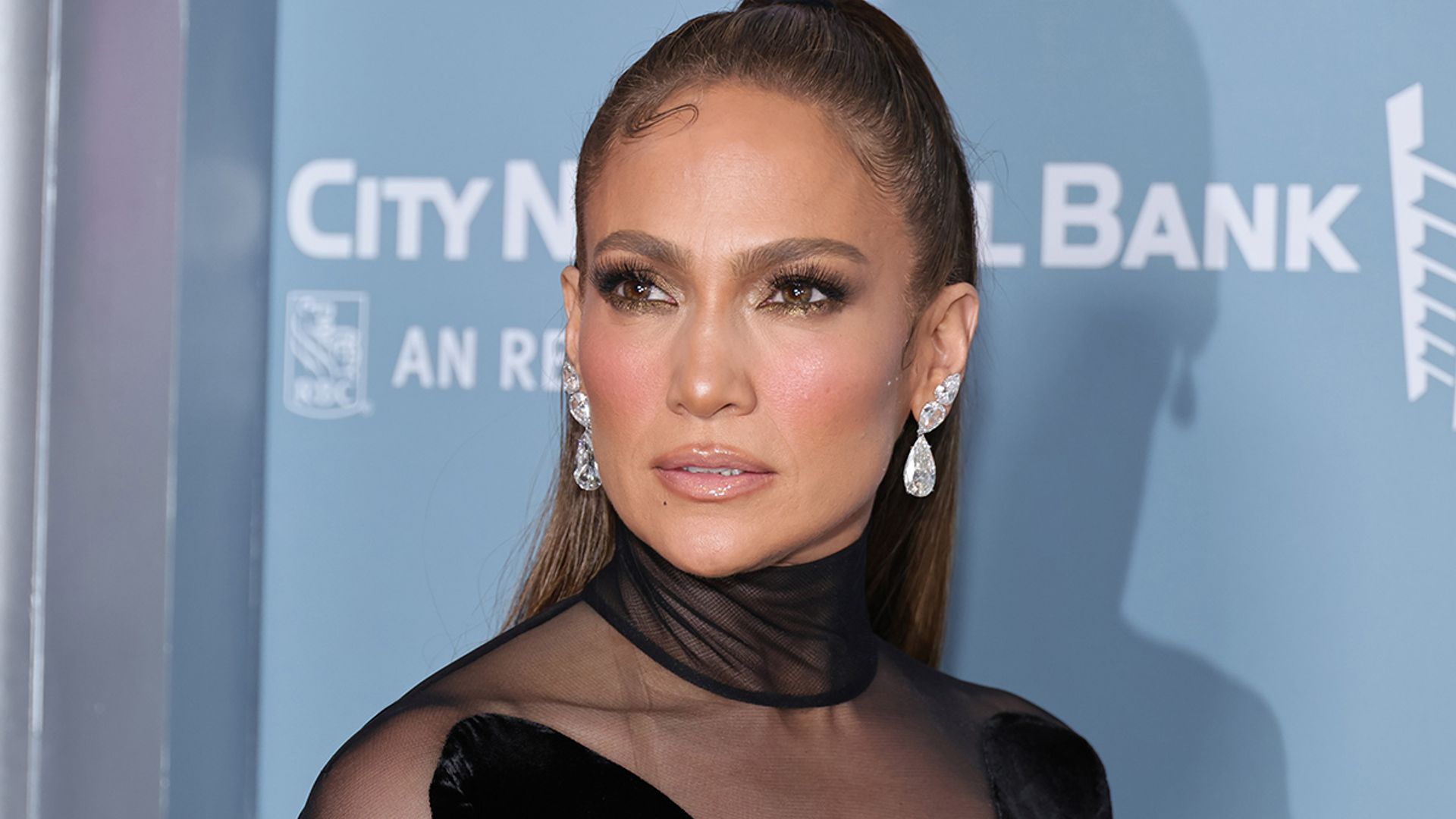 Jennifer Lopez looks out of this world in leg baring dress for the launch of her shoe line