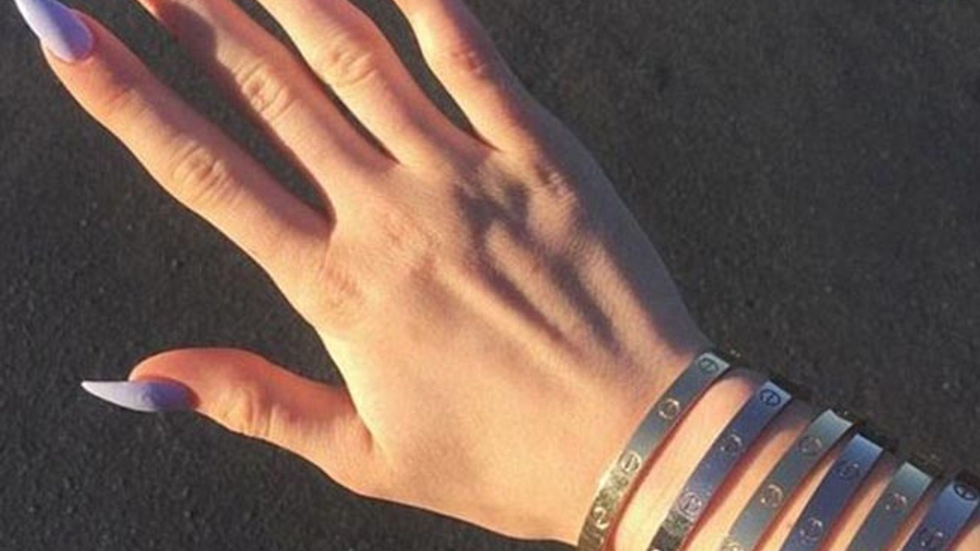 15-Year-Old Kylie Jenner Wears Super-Skimpy Outfit and Four Cartier Love  Bracelets
