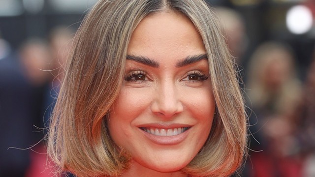  Frankie Bridge wears a red suit as she attends "The Wild Robot" Headline Gala during the 68th BFI London Film Festival at The Royal Festival Hall on October 13, 2024 in London, England.