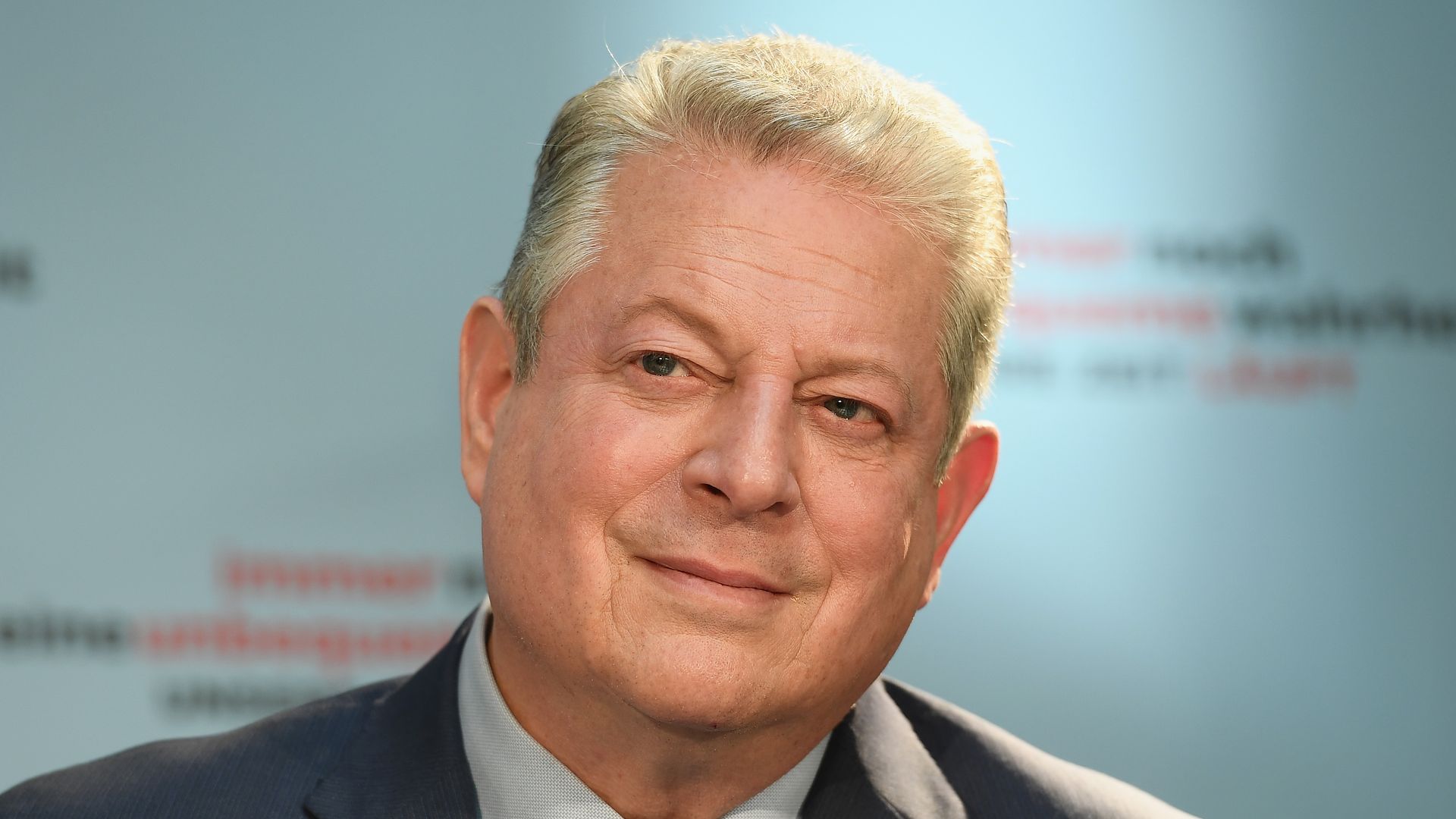Al Gore wearing suit and tie 