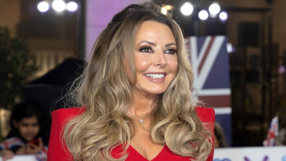 Carol Vorderman struts her stuff in skin tight leather trousers