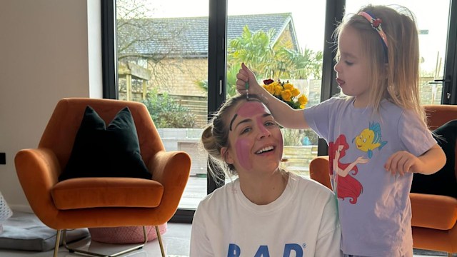 Gemma Atkinson being drawn on by her daughter Mia 