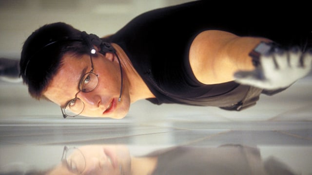 American actor Tom Cruise as Ethan Hunt in a scene from the film 'Mission: Impossible', 1996. Here he steals the NOC list from the CIA headquarters in Langley.
