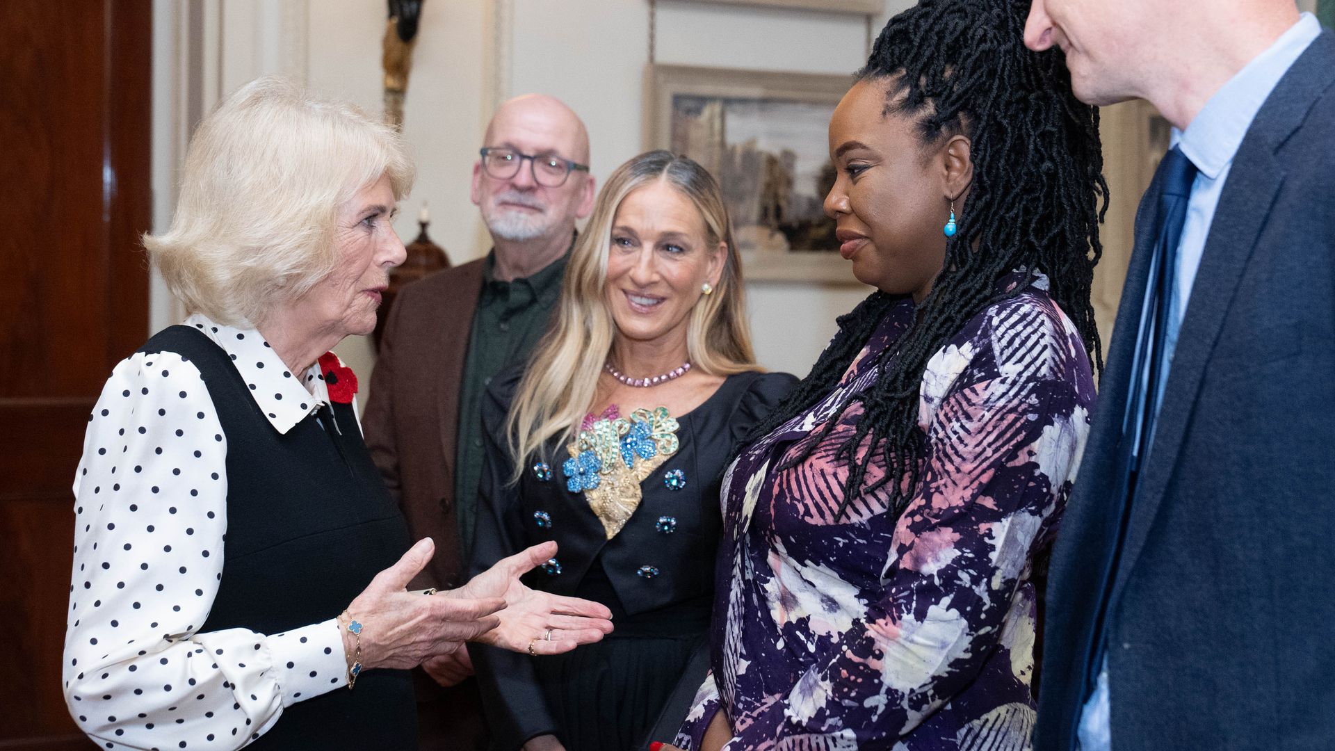 Queen Camilla speaking with this year's judges, including Sarah Jessica Parker
