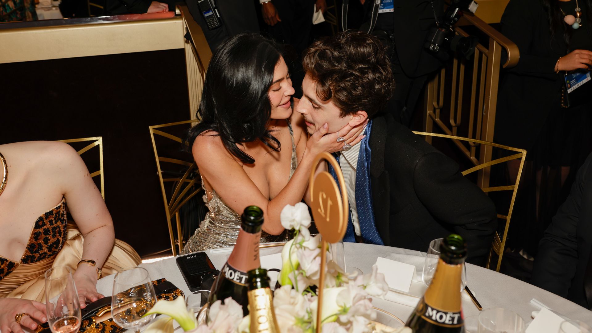 Kylie Jenner and Timothée Chalamet kissing at the 2025 golden globes
