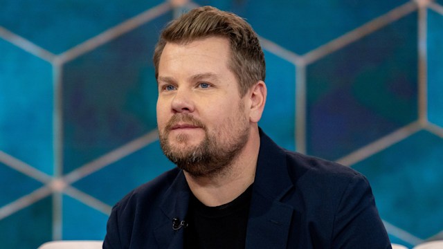 James Corden sitting on a cream sofa looking at camera while filming TODAY on NBC