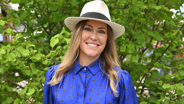 Cerys Matthews smiling while attending the Chelsea Flower Show on May 23, 2022 in London