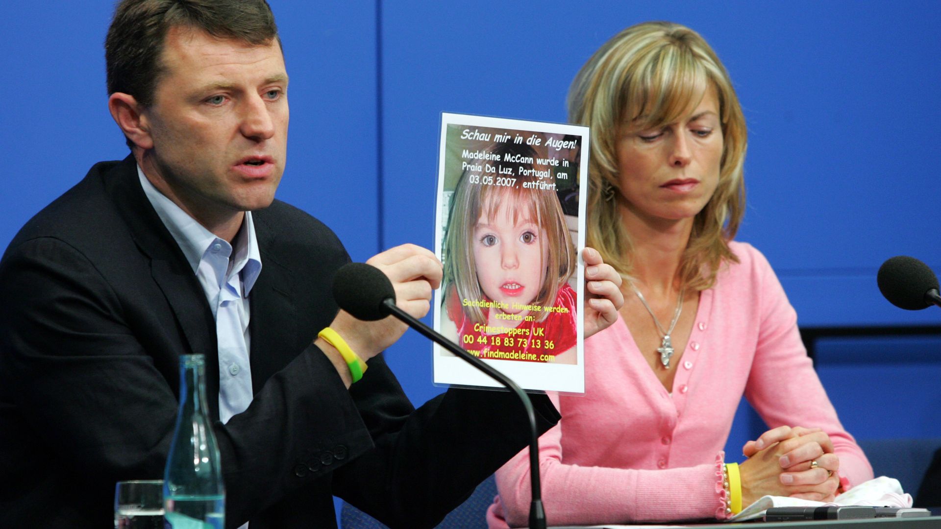Kate and Gerry McCann hold up a picture of Madeleine during a press conference in 2007